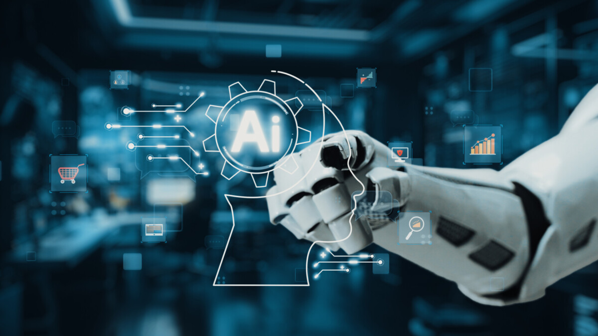 Futuristic Robot Hand Pointing at Artificial Intelligence Symbol in Modern Data-Driven Workspace with Digital Graphics and Technology Background. Auvana - ESG Journal